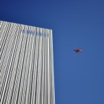 Wyly Theatre west elev sky with plane