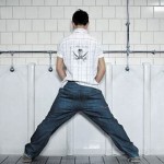 Men and Urinals…Time for one of them to change